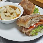 picture of a soup and a sandwich