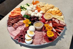 photo of charcuterie board with eggs and vegetables