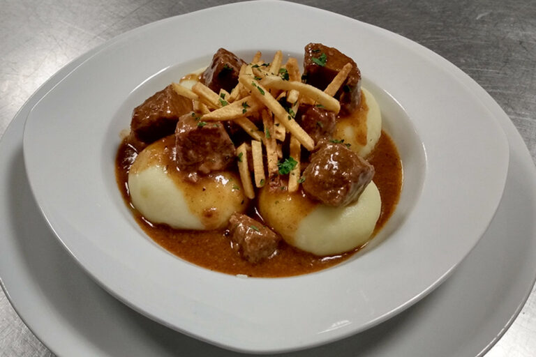image of potato dumplings with goulash souce