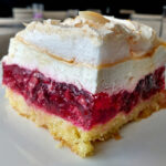 image of raspberry cake made with fresh raspberry, jell-o, whipped mascarpone and almond meringue